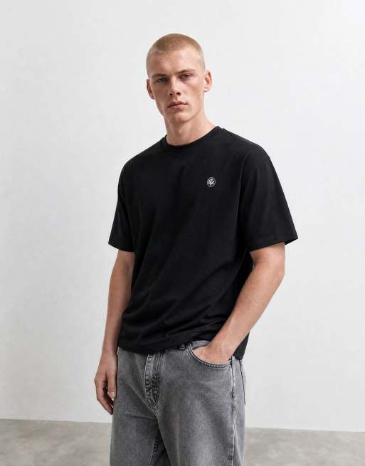ASOS DESIGN - T-shirt oversize nera con grafica floreale ricamata, 10 di 10