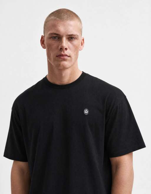ASOS DESIGN - T-shirt oversize nera con grafica floreale ricamata, 9 di 10