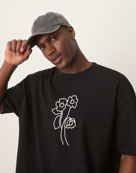 ASOS DESIGN - T-shirt oversize nera con grafica floreale - view 1