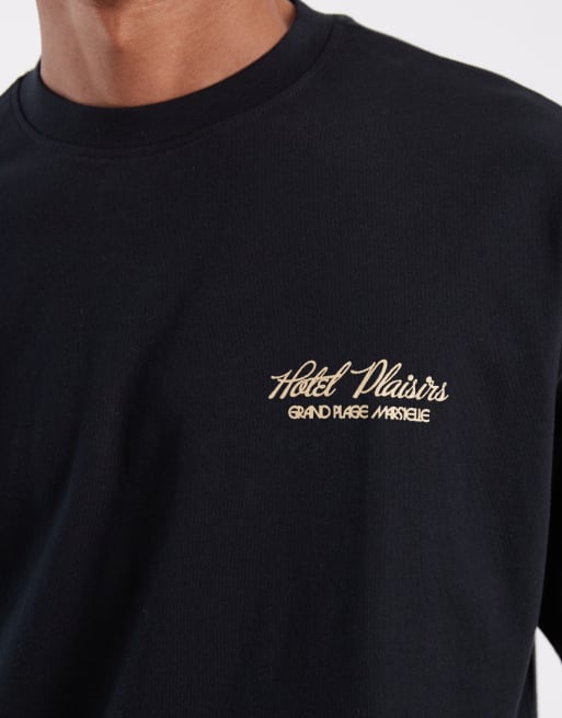 ASOS DESIGN - T-shirt oversize nera con grafica spiaggia, 4 di 5