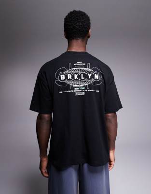 ASOS DESIGN - T-shirt oversize nera con grafiche "Street" - view 1