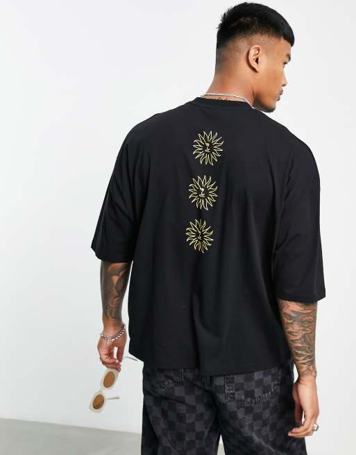 ASOS DESIGN - T-shirt oversize nera con sole stampato sul retro
