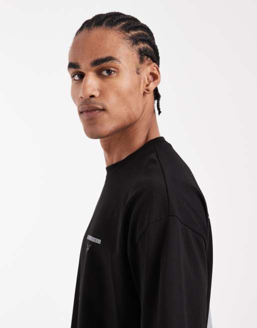ASOS DESIGN - T-shirt oversize nera con stampa floreale, 4 di 5