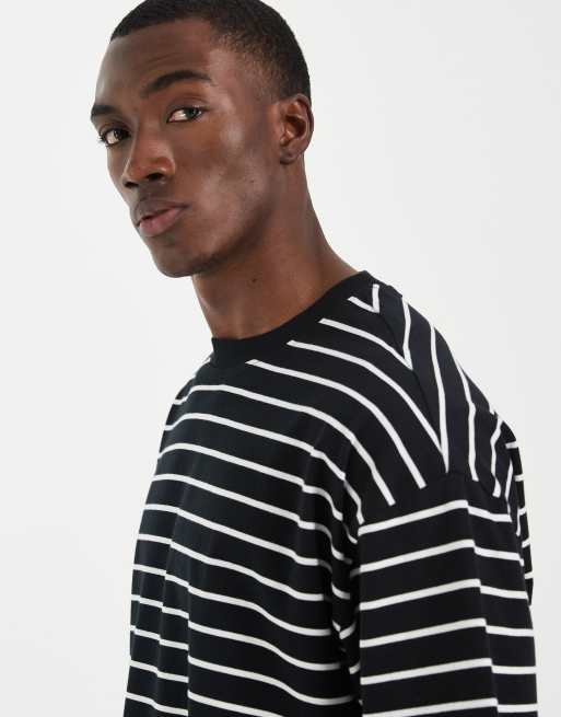 ASOS DESIGN - T-shirt oversize nera e panna a righe, 3 di 5