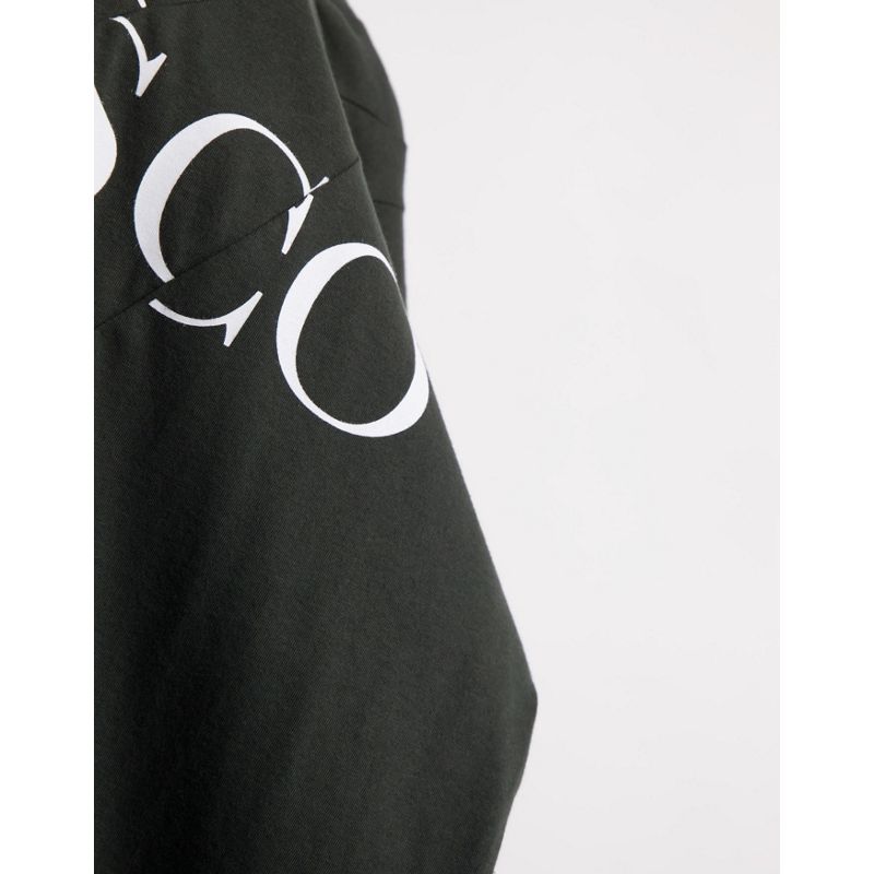 Top T-shirt e Canotte DESIGN - T-shirt oversize nero slavato con stampa disco effetto tagliato