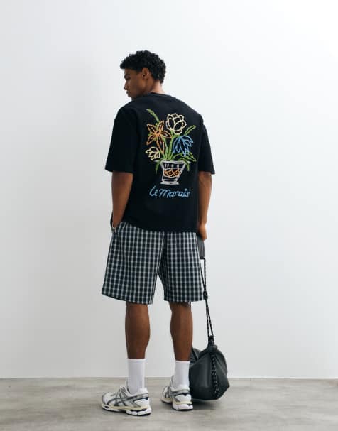 ASOS DESIGN - T-shirt oversize pesante in tessuto crepe nero con stampa floreale in rilievo - view 1