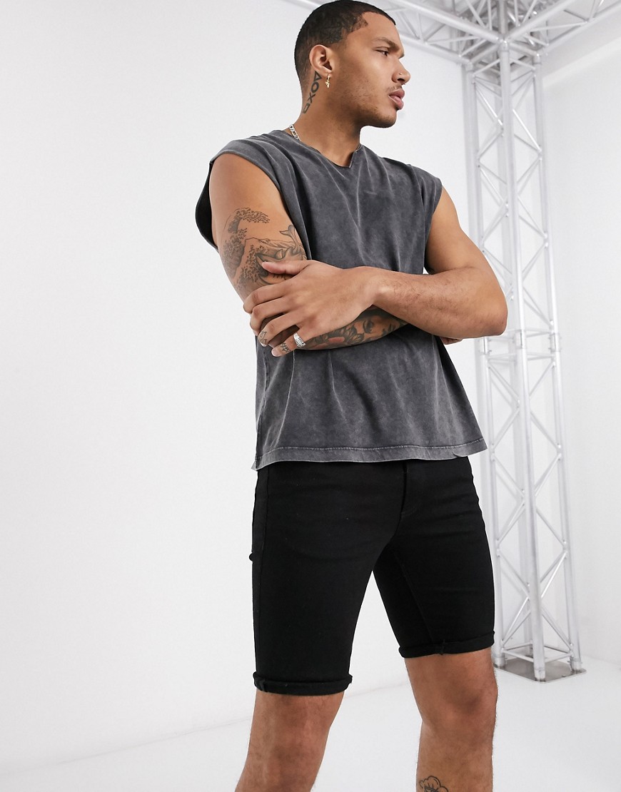 ASOS DESIGN - T-shirt oversize senza maniche con scollo con intaglio lavaggio acido nero