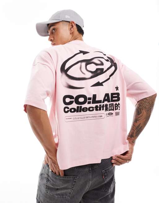 ASOS DESIGN - T-shirt oversize squadrata con spalle scese rosa con grafica