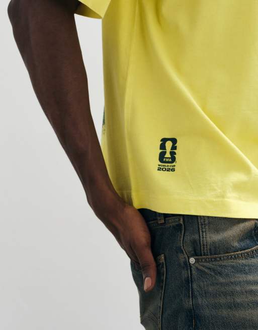 ASOS DESIGN - T-shirt oversize squadrata gialla con stampa "Fifa World Cup Brazil", 5 di 5