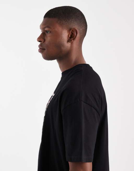 ASOS DESIGN - T-shirt oversize squadrata nera con stampa grafica di francobollo con fiore, 4 di 5