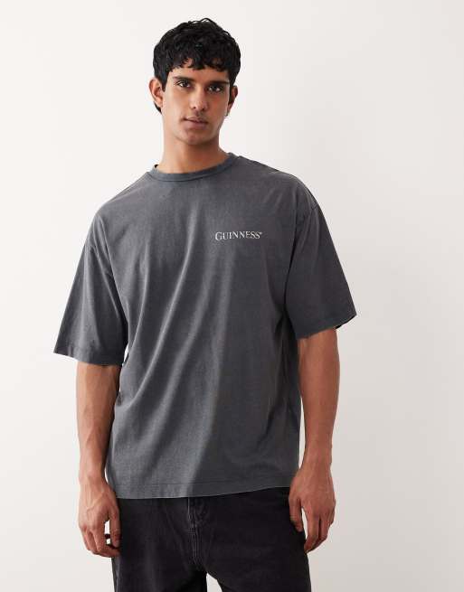 ASOS DESIGN - T-shirt oversize unisex nero slavato con stampa "Guinness", 3 di 5