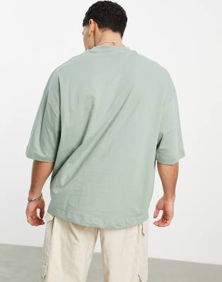 T-shirt oversize verde con stampa outdoors - ASOS DESIGN T-shirt donna  - immagine1