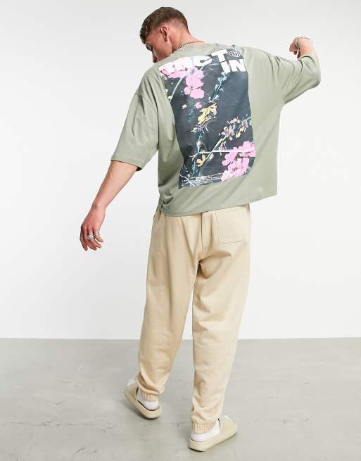 ASOS DESIGN – T-shirt oversize z bawełny w kolorze khaki z fotograficznym kwiatowym nadrukiem na plecach – KHAKI