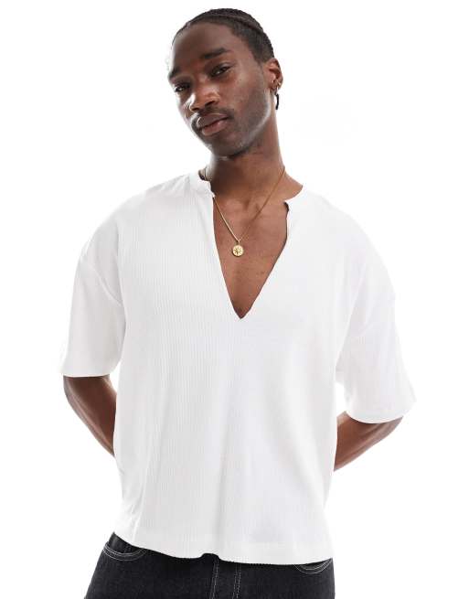 ASOS DESIGN - T-shirt squadrata oversize bianca con scollo a V profondo intagliato bianco a coste