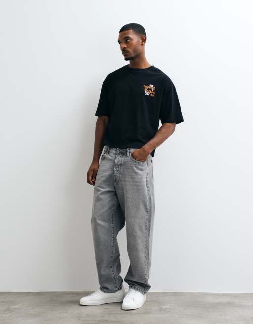 ASOS DESIGN - T-shirt squadrata oversize nera con grafica a fiori sul retro, 2 di 5