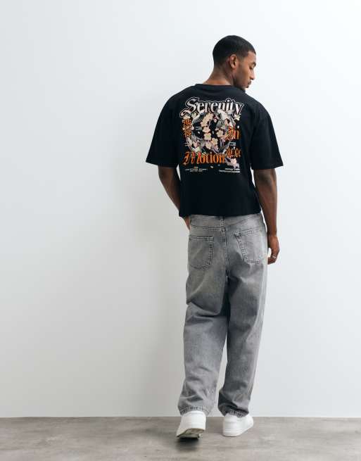 ASOS DESIGN - T-shirt squadrata oversize nera con grafica a fiori sul retro, 4 di 5