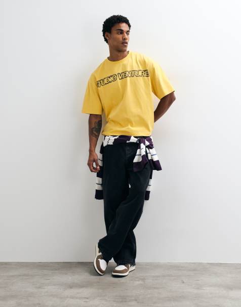 ASOS DESIGN T-shirt squadrata oversize slavata con grafica testuale gialla - view 1