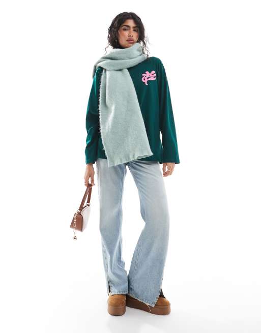 ASOS DESIGN - T-shirt stile skater a maniche lunghe verde con fiore, 4 di 4