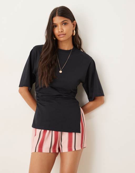 ASOS DESIGN - T-shirt stretta in vita con lato asimmetrico sull'orlo color blu navy