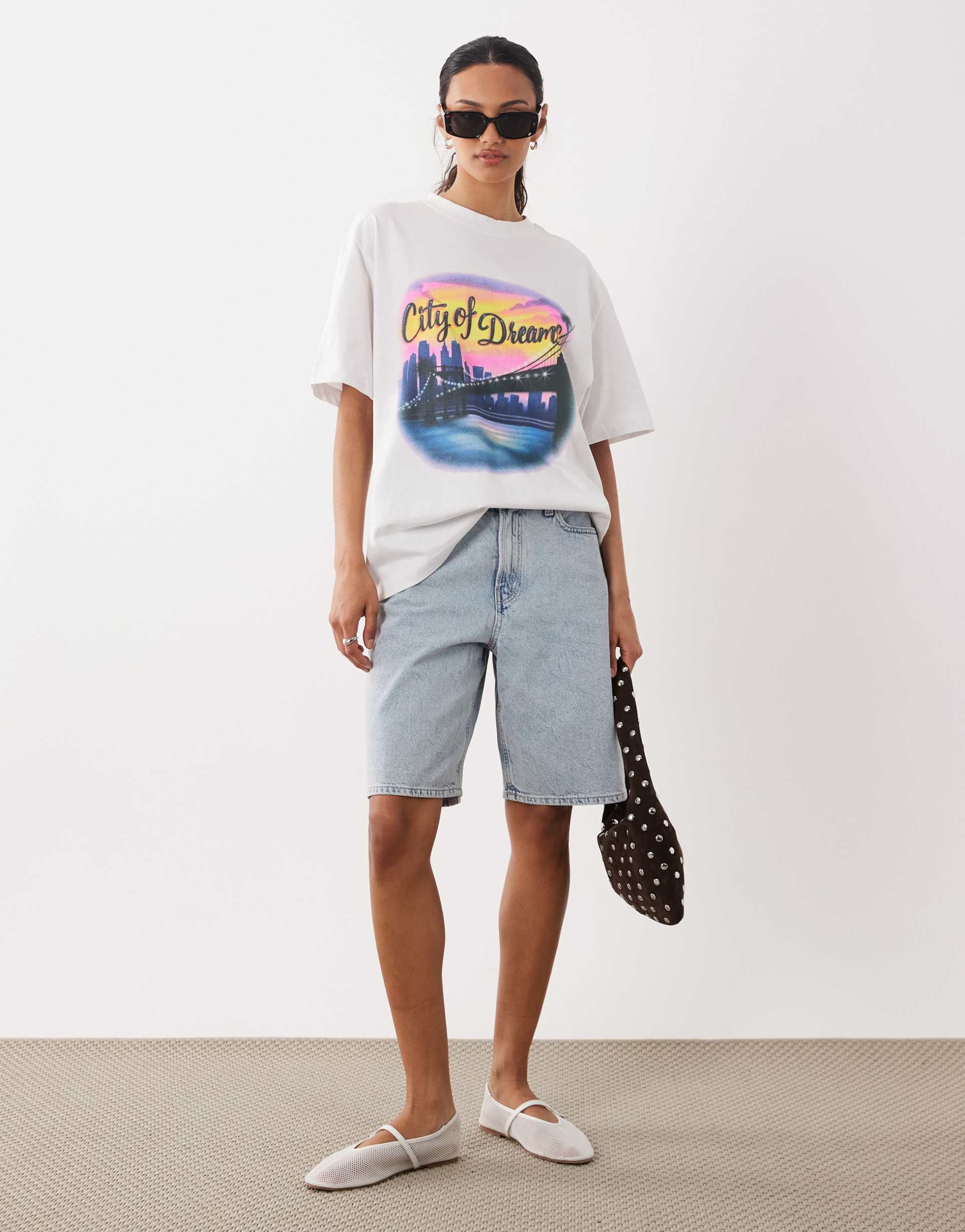 asos design t-shirt with city of dreams airbrush graphic in washed charcoal