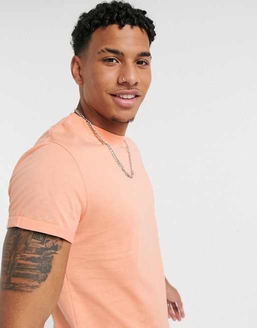ASOS DESIGN t-shirt with roll sleeve in orange