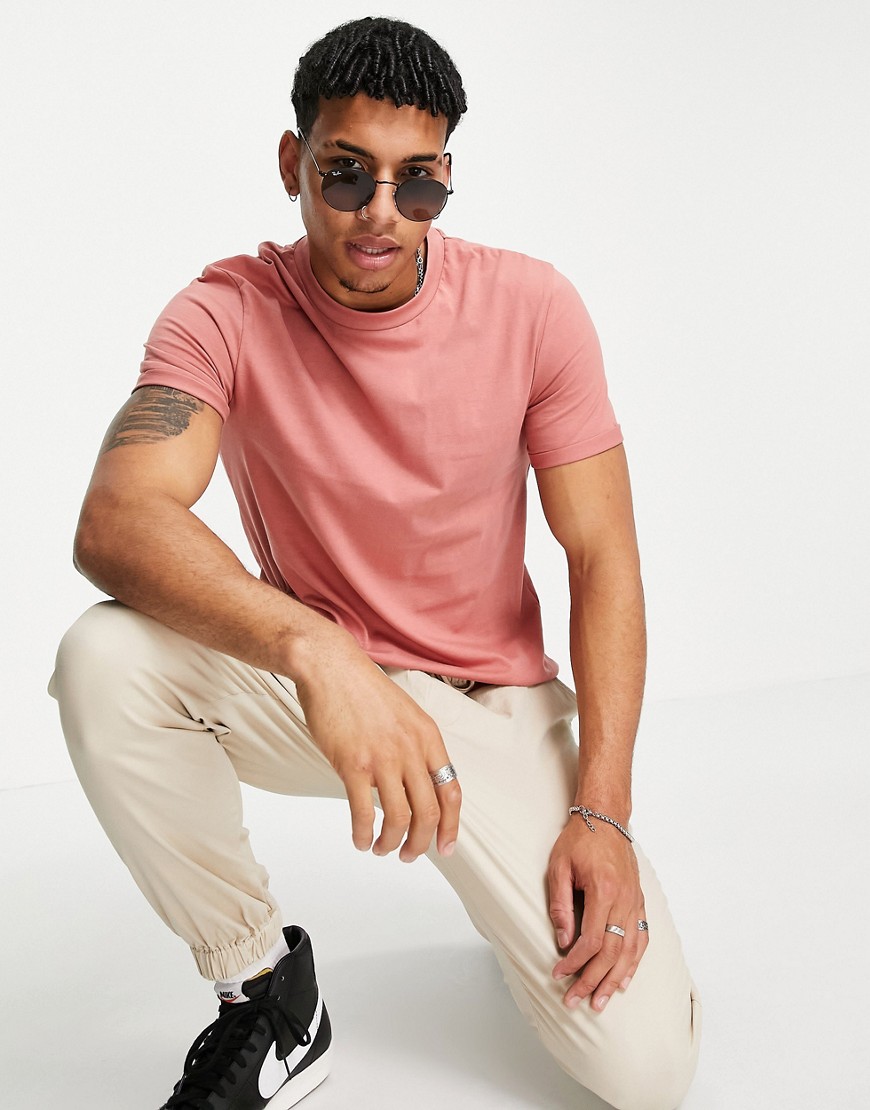 ASOS DESIGN T-shirt with roll sleeves in washed pink