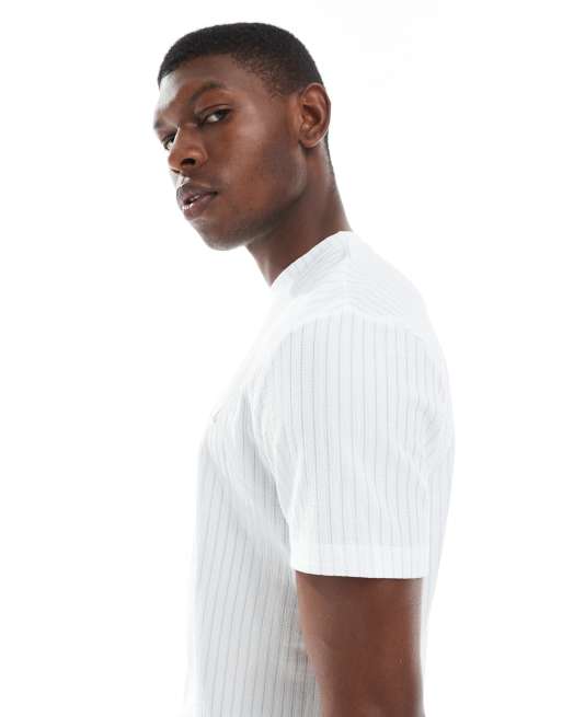 ASOS DESIGN T-shirt with studio embroidery in textured blue and off white stripe