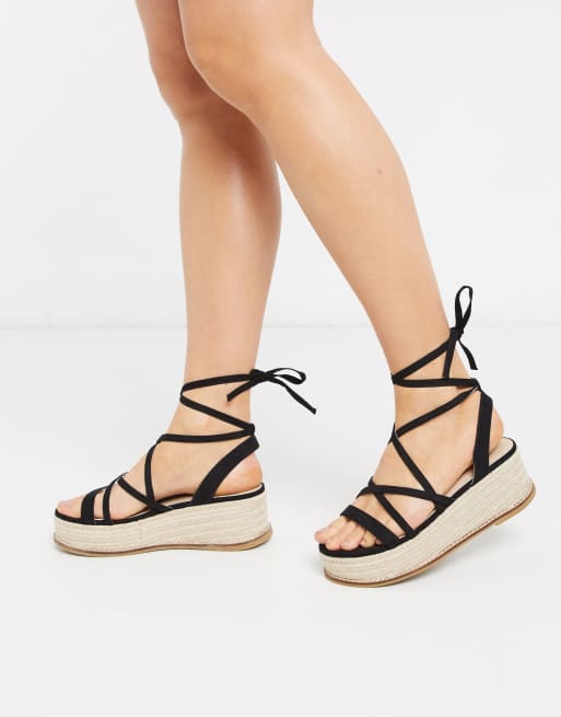 ASOS DESIGN Tabby flatform tie leg sandals in black | ASOS