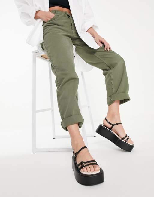 ASOS DESIGN – Tactile – Czarne sandały na płaskiej platformie z paseczkami z klamrami 