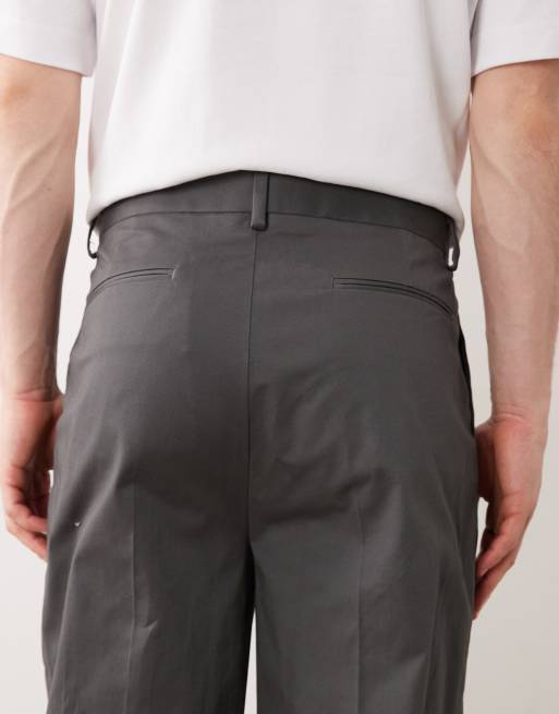 ASOS DESIGN tailored cotton rich oversized tapered chino trousers in charcoal with front pleats, 4 of 5