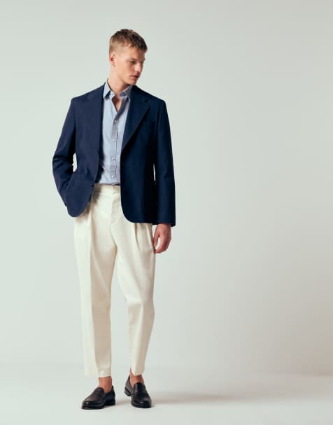 ASOS DESIGN tailored cotton rich relaxed tapered chino pants in ecru with front pleats - view 1