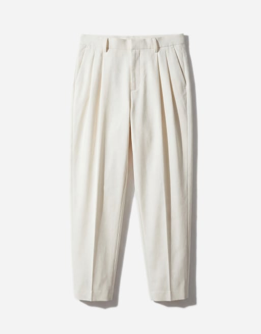 ASOS DESIGN tailored cotton rich relaxed tapered chino trousers in ecru with front pleats, 6 of 12