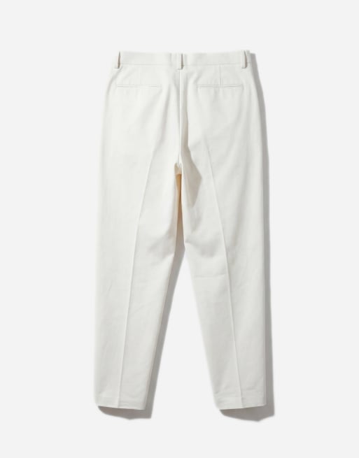ASOS DESIGN tailored cotton rich relaxed tapered chino trousers in ecru with front pleats, 7 of 12