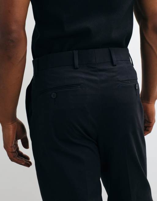 ASOS DESIGN tailored cotton rich tapered chino trousers in black with turnup, 3 of 5