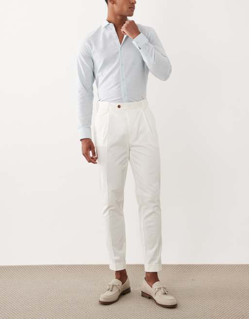 ASOS DESIGN tailored cotton rich tapered chino trousers in white with turnup, 2 of 5