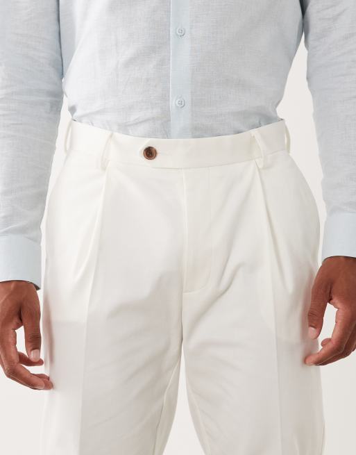 ASOS DESIGN tailored cotton rich tapered chino trousers in white with turnup, 4 of 5