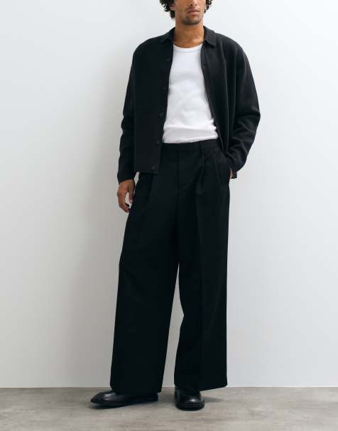 ASOS DESIGN tailored double pleated loose leg pants in black - view 1