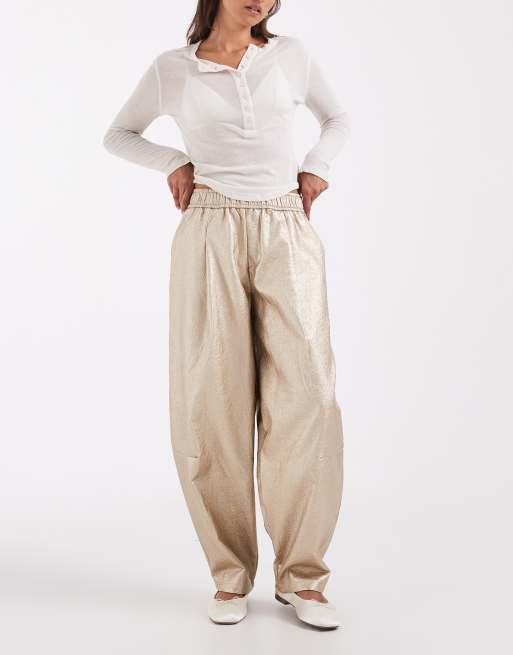 ASOS DESIGN Tailored faux leather tapered trouser in textured gold, 2 of 5