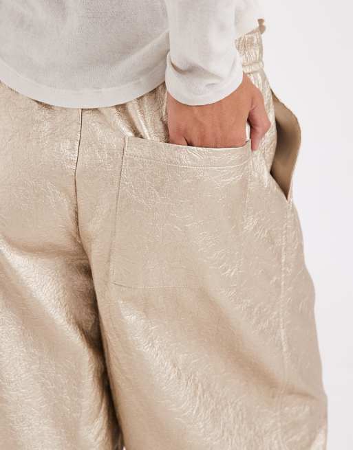 ASOS DESIGN Tailored faux leather tapered trouser in textured gold, 5 of 5