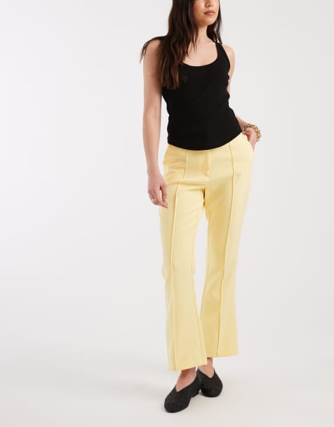 ASOS DESIGN tailored kick flare pants in lemon - view 1