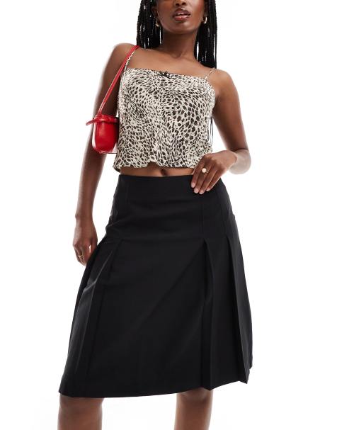 ASOS DESIGN tailored knee length pleated midi skirt in black - view 1