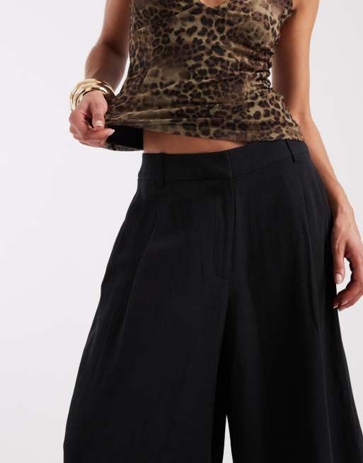 ASOS DESIGN Tailored longline bermuda shorts in black, 4 of 5