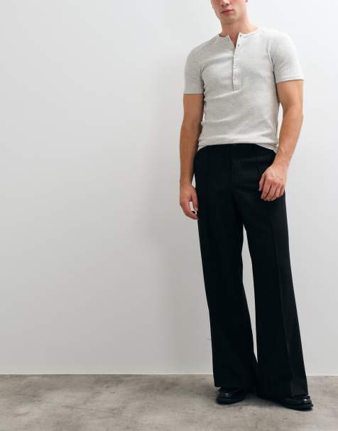 ASOS DESIGN tailored loose leg pants in black with pintuck - view 1