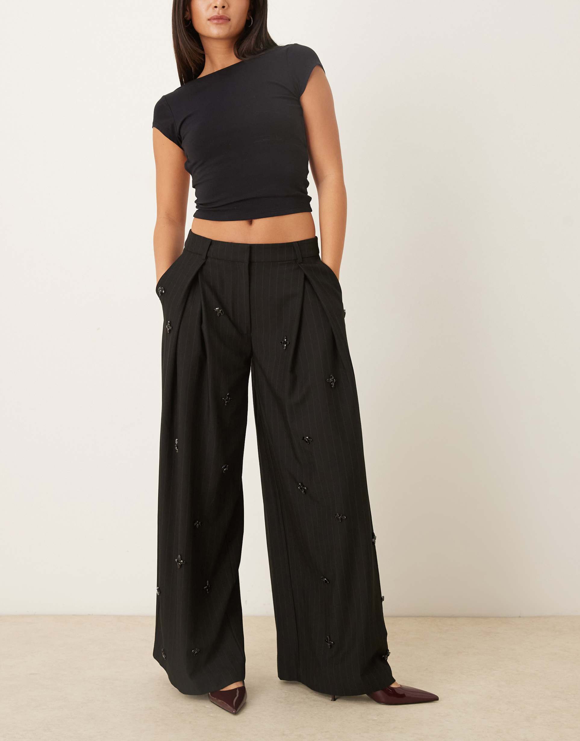 asos design tailored low rise embellished pants in black pinstripes
