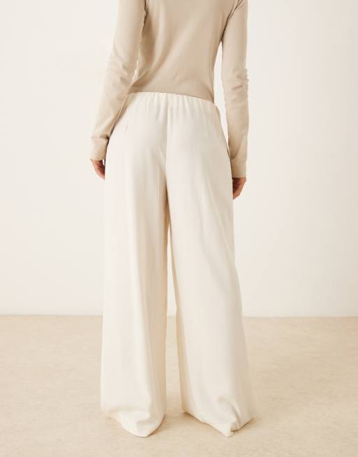 ASOS DESIGN tailored low rise pull on trousers in cream, 3 of 5
