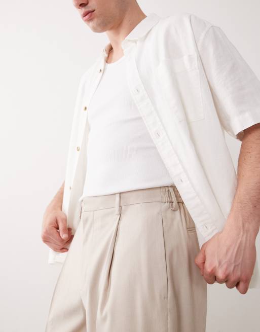 ASOS DESIGN tailored oversized tapered trousers with elasticated waist in stone, 5 of 5
