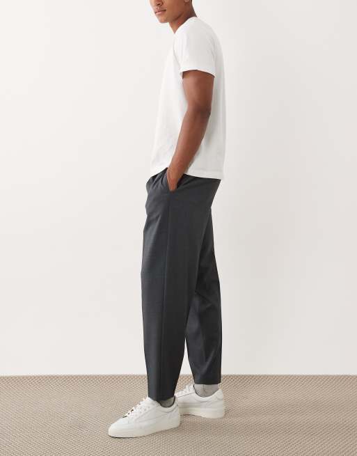 ASOS DESIGN tailored pleated denim look relaxed tapered trousers in dark blue, 3 of 5