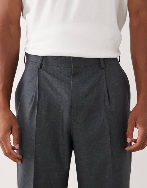 ASOS DESIGN tailored pleated denim look relaxed tapered trousers in dark blue, 4 of 5