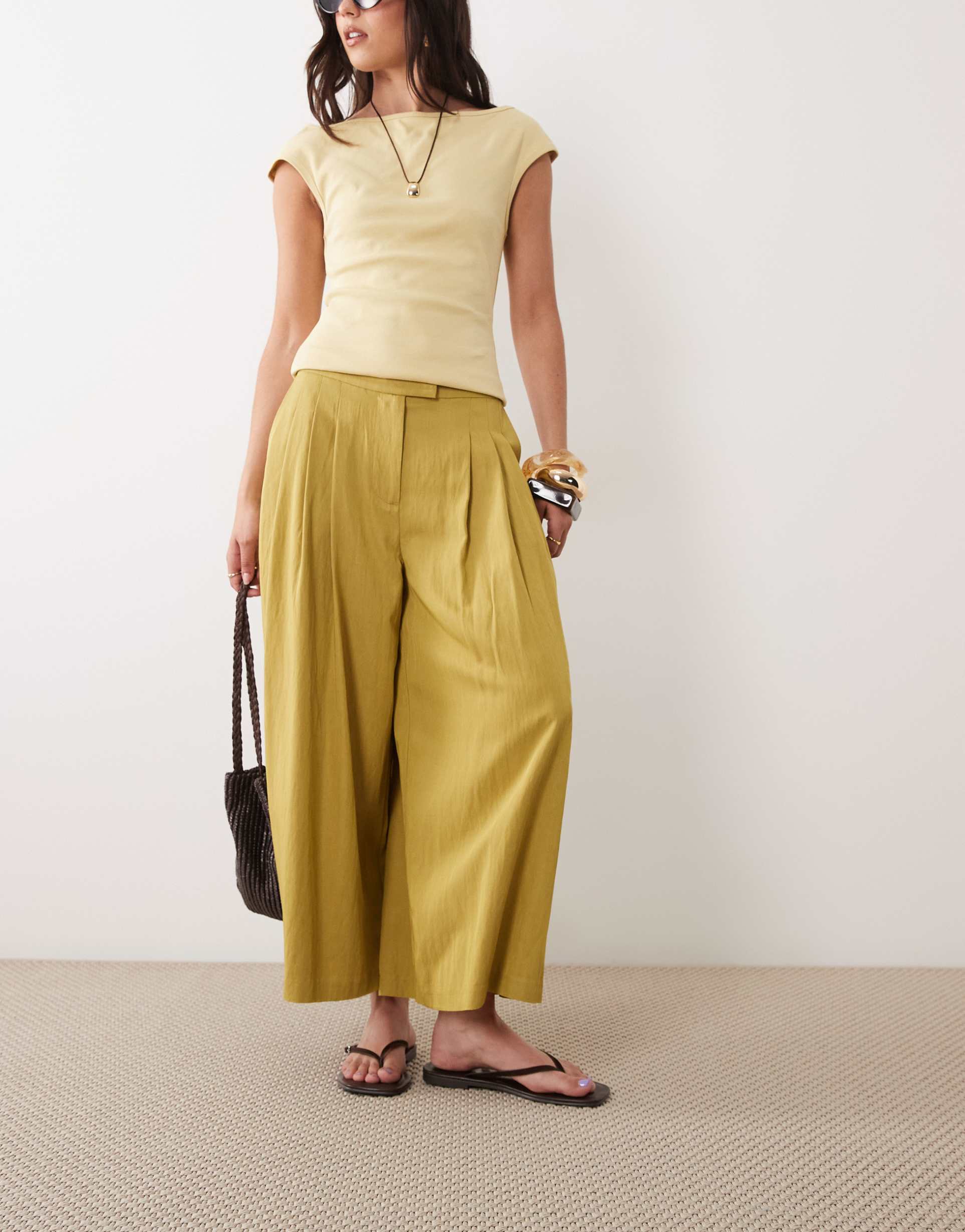 asos design tailored pleated floaty culotte pants in gold