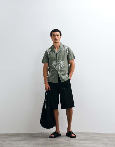 ASOS DESIGN tailored pleated oversized bermuda shorts in black - view 1